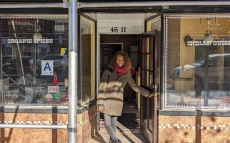 46-11 Skillman Ave in Sunnyside, Queens, under scaffolding before the Makina Cafe buildout